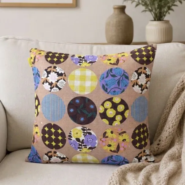 Apricot Circle Bloom Kyoto cotton pillow cover on a cream sofa
