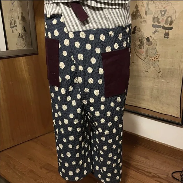 Handmade polka-dot seersucker trousers with burgundy pockets, made by a customer