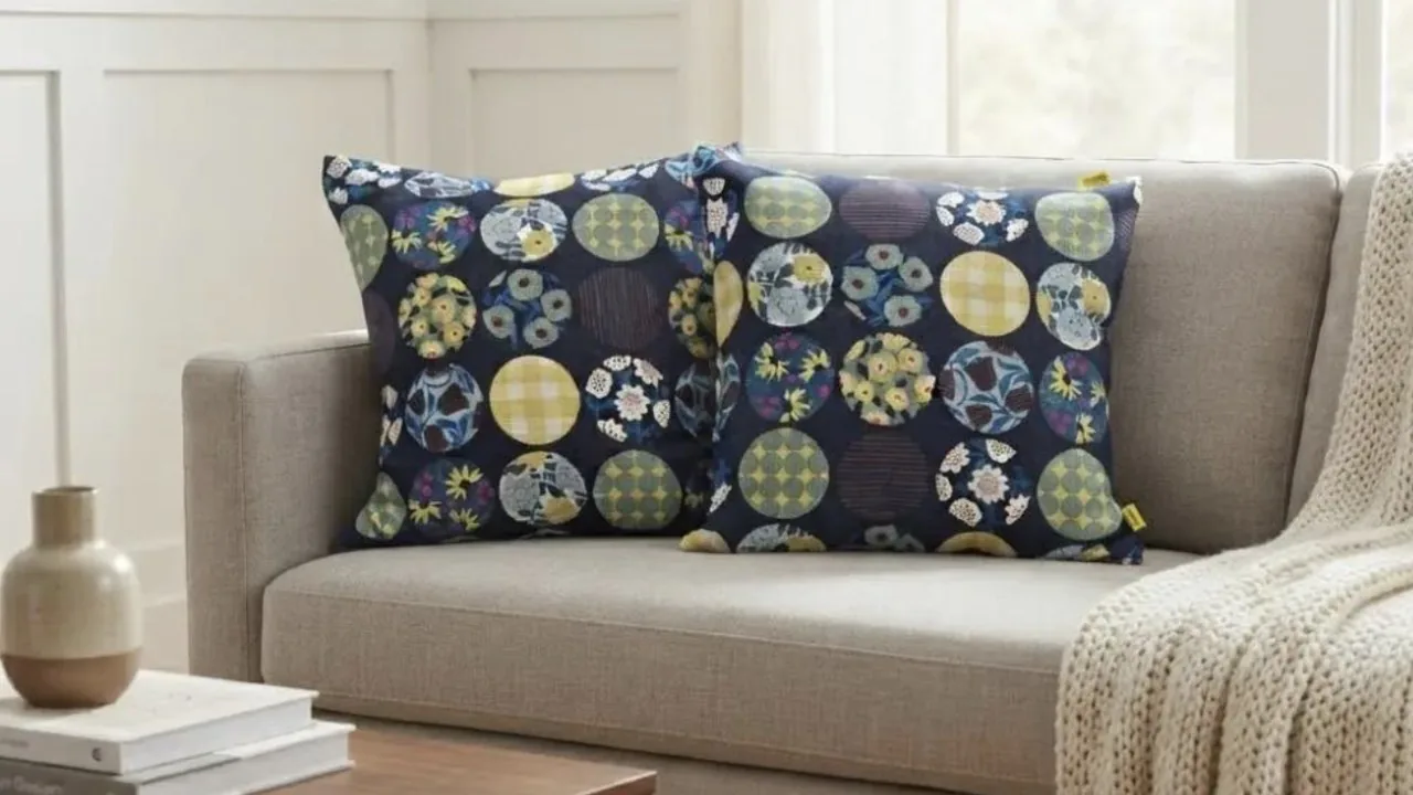 Two Circle Bloom Midnight Indigo Kyoto cotton pillow covers on a linen sofa